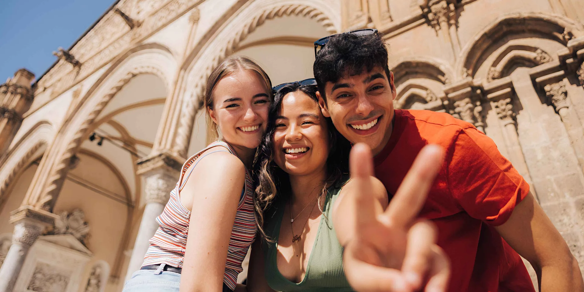 Group Exploring And Taking Photo In Sicily