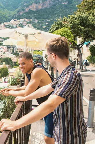 Two travellers admire the view over Positano on the Amalfi Coast, Italy - Contiki Amalfi Coast Summer Tour