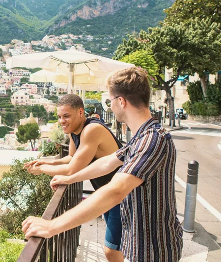 Two travellers admire the view over Positano on the Amalfi Coast, Italy - Contiki Amalfi Coast Summer Tour