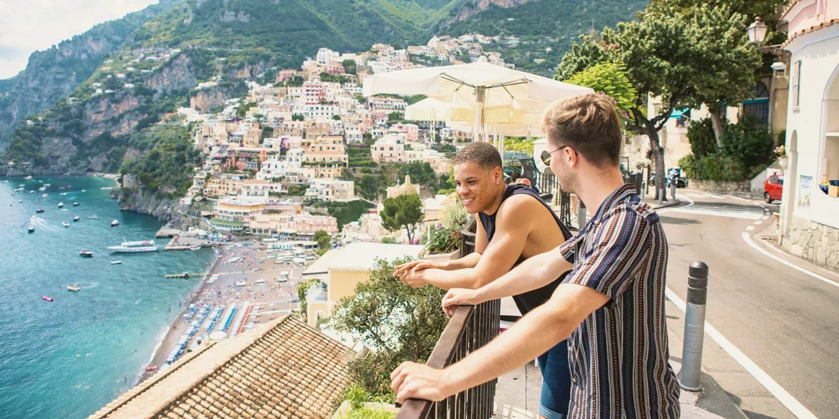 Two travellers admire the view over Positano on the Amalfi Coast, Italy - Contiki Amalfi Coast Summer Tour