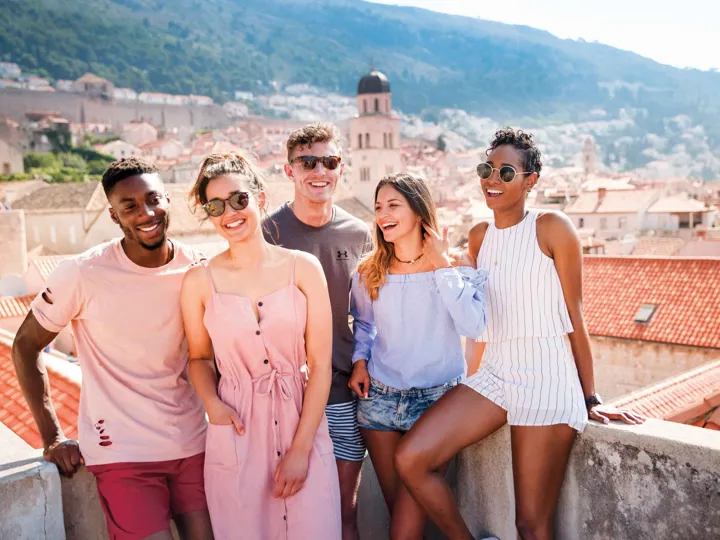 Group Of Contiki Travelers On Rooftop Dubrovnik Croatia