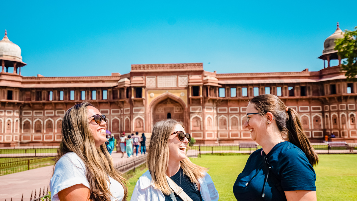 Friends Lauging Outside Red Fort