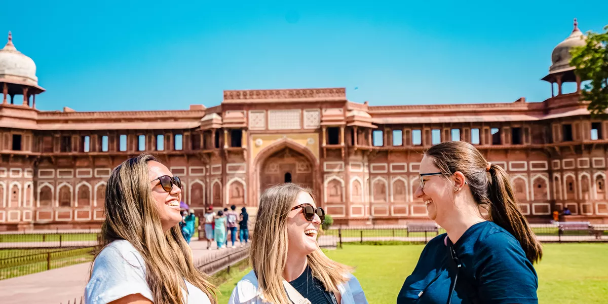 Friends Lauging Outside Red Fort