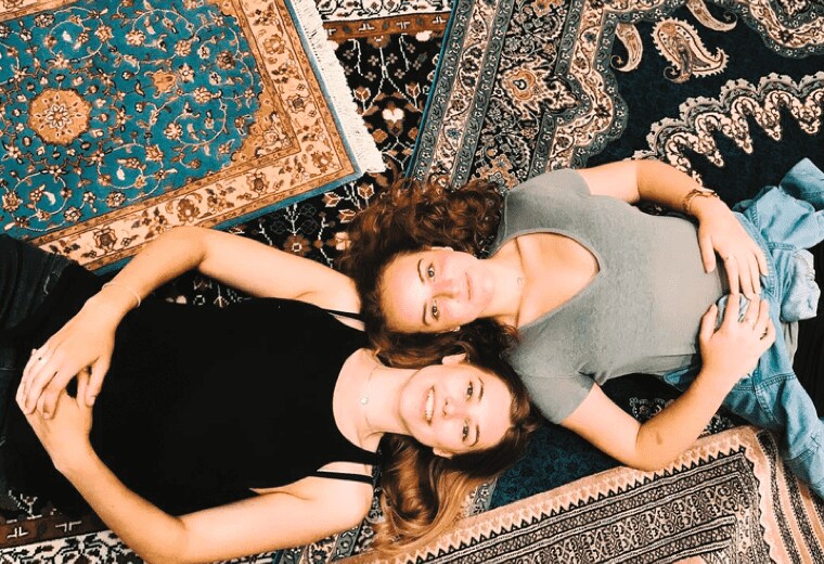 Woman Laying on Carpets in Morocco