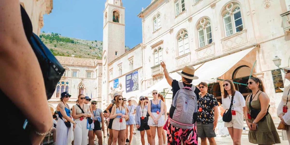 Group Of People Enjoying A Walking Dubrovnik Tour Sunny Day