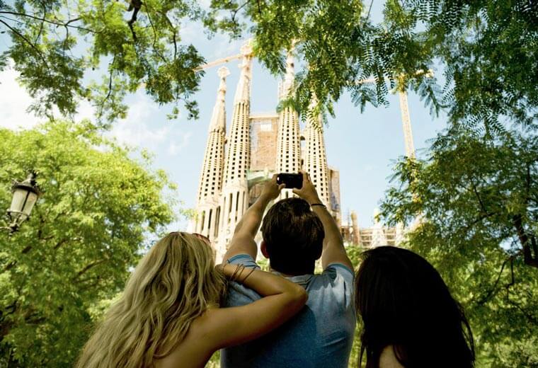 Taking photo of Sagrada Familia Cathedral in Barcelona, Spain 