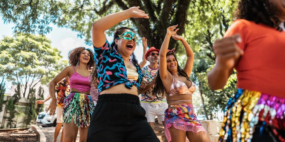 People Dancing And Smiling On The Street