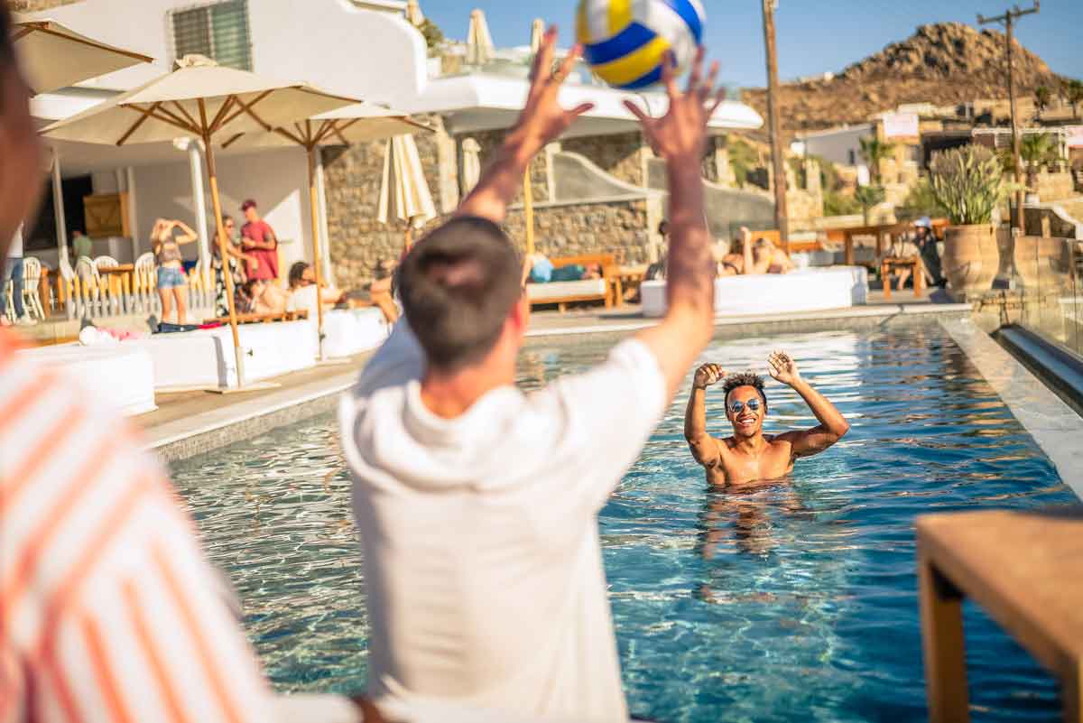 People In Pool Volleyball Greece