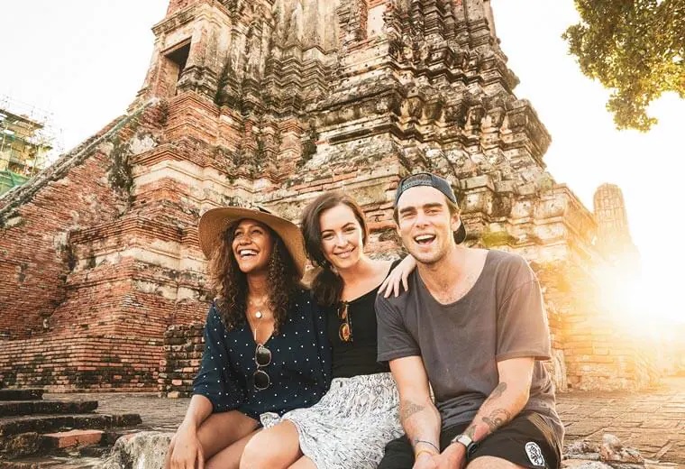 Young People Smilling and Sitting Together