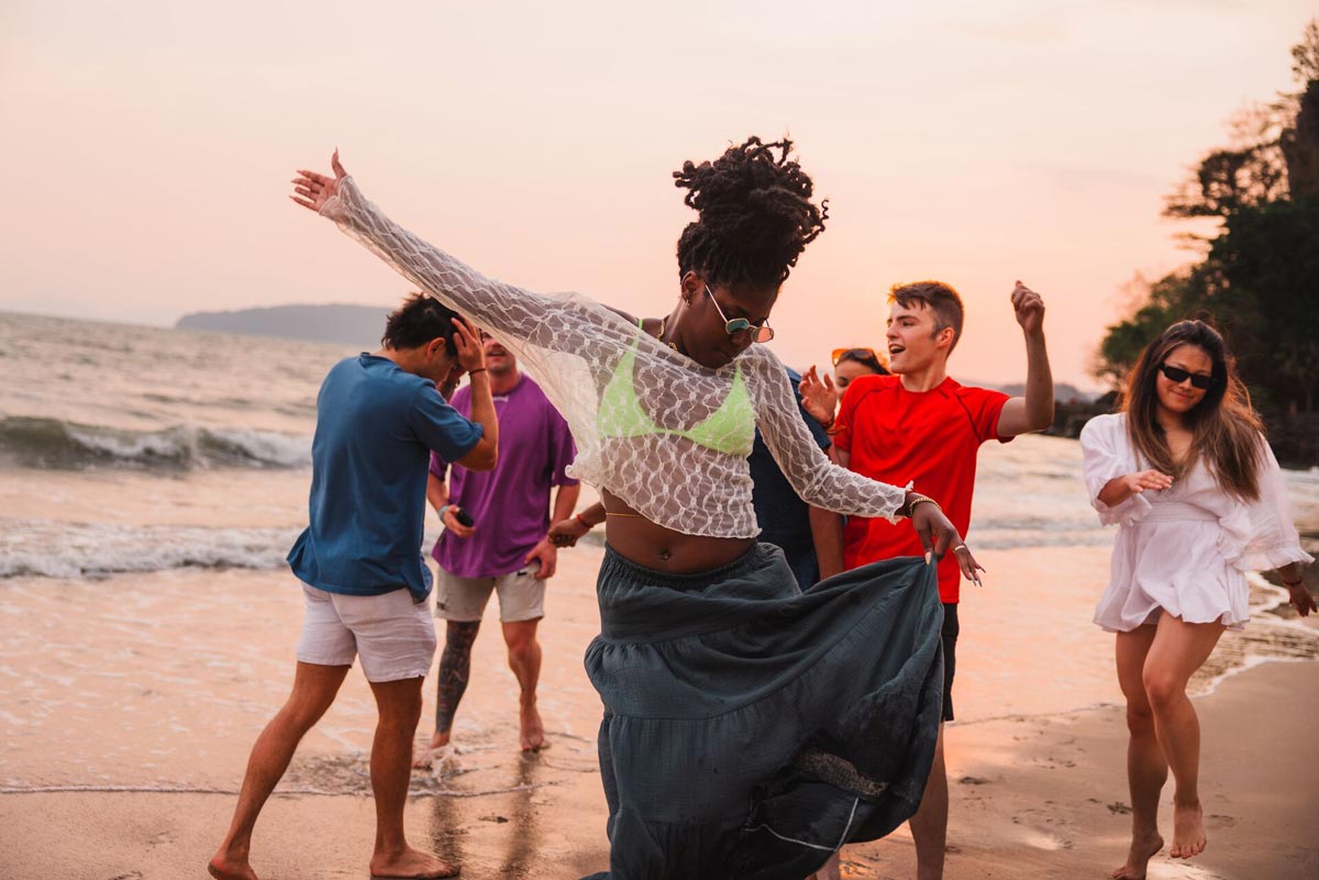 Friends Dancing On The Beach Sunny Day