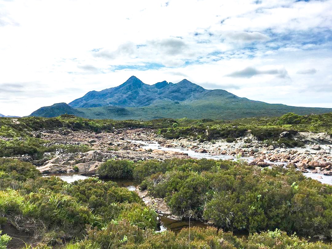 A view of a river and mountains in the West Highlands of Scotland