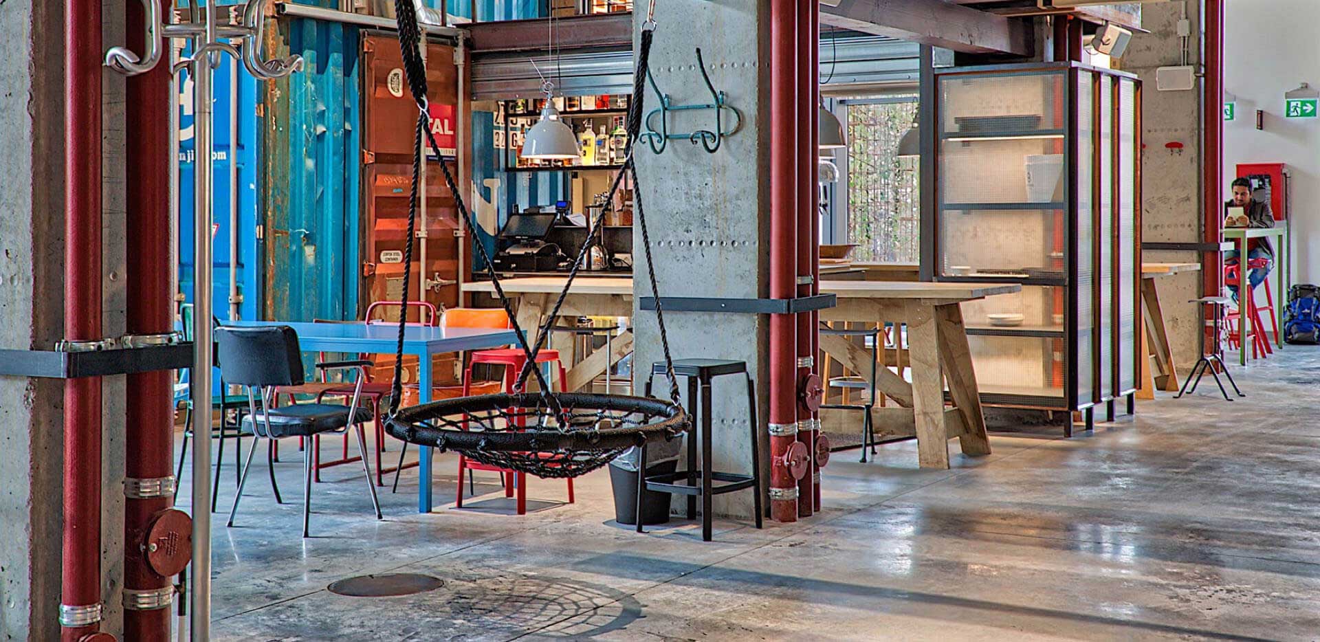 A colorful living room with a bar