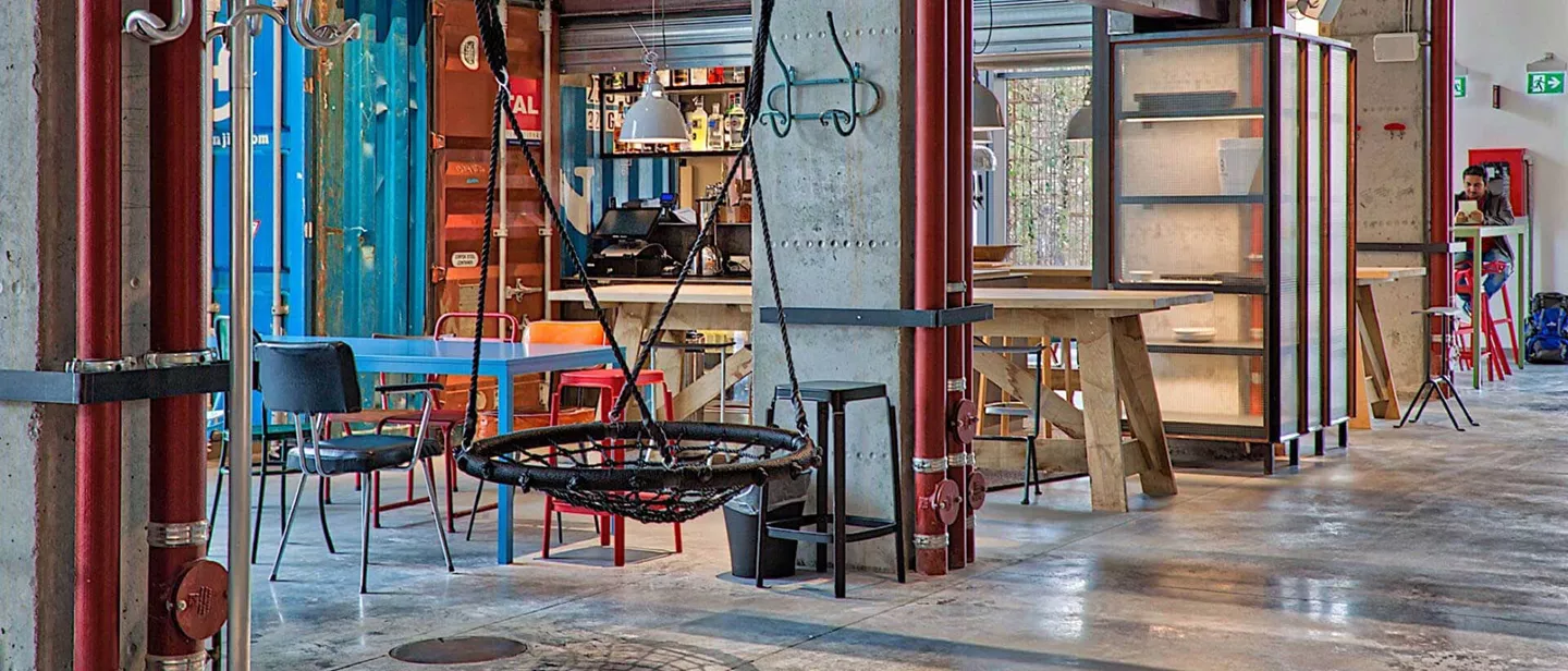 A colorful living room with a bar