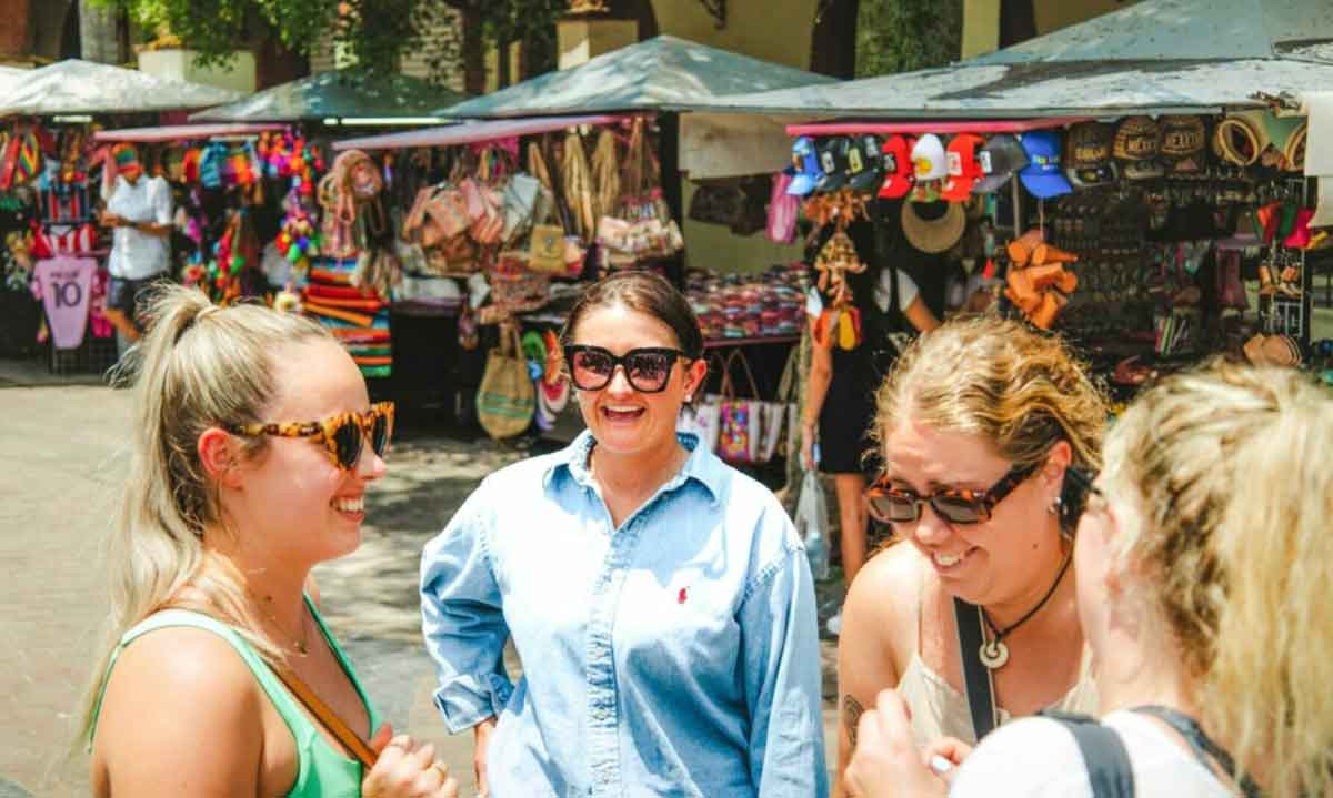Young Travelers Smiling Mexico Street Market
