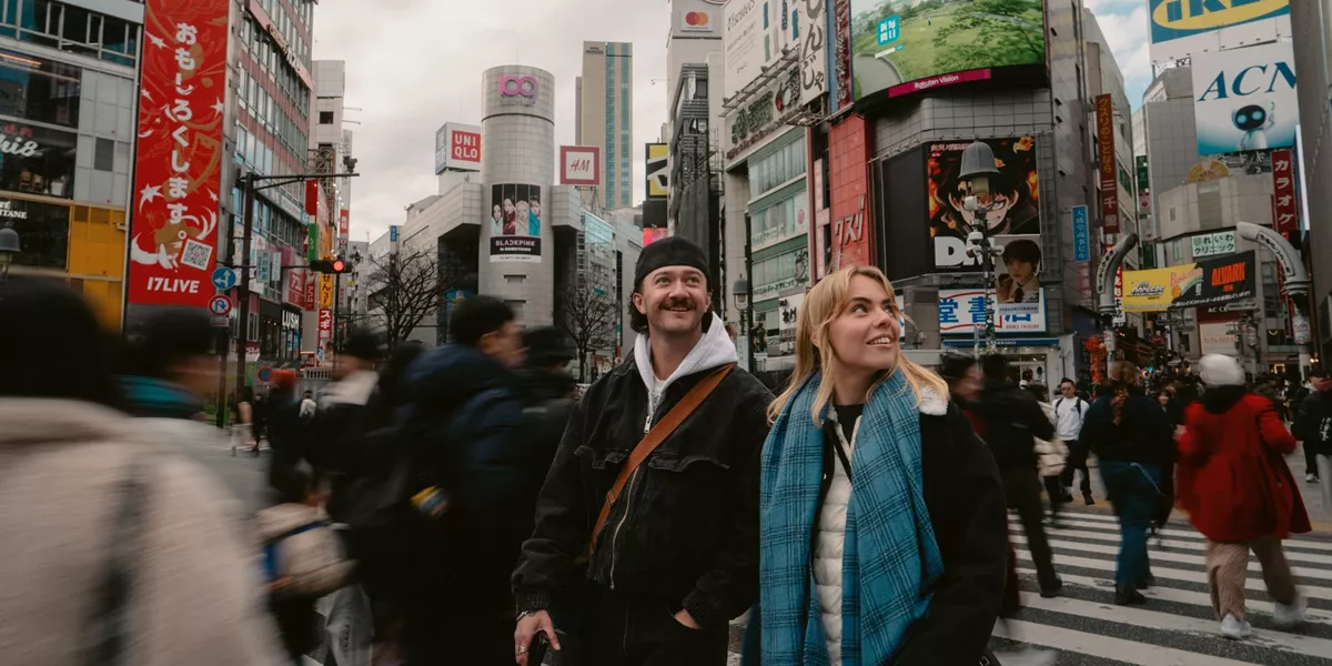 Contiki travellers experience the energy of Shibuya Crossing in Tokyo during Contiki's Japan in Winter by Train Tour