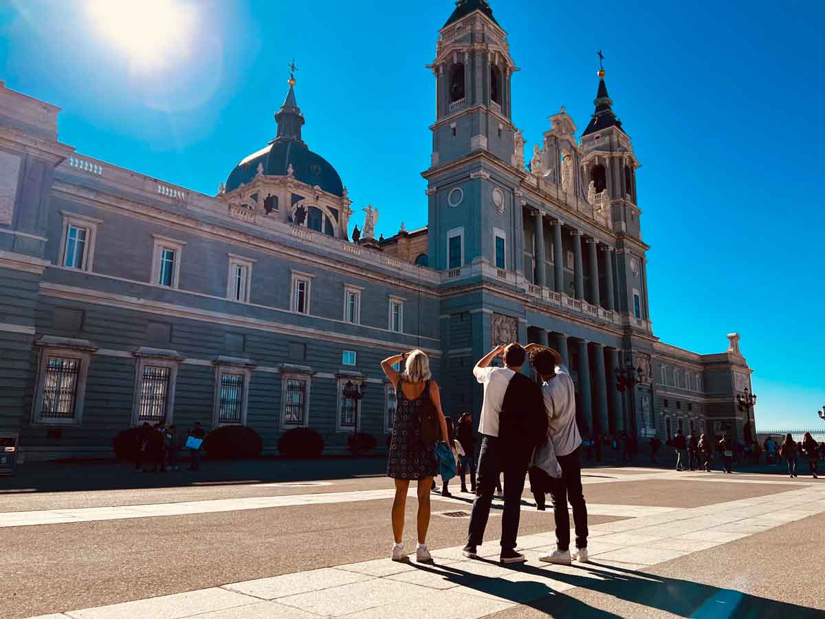 Travelers In City Monument Madrid