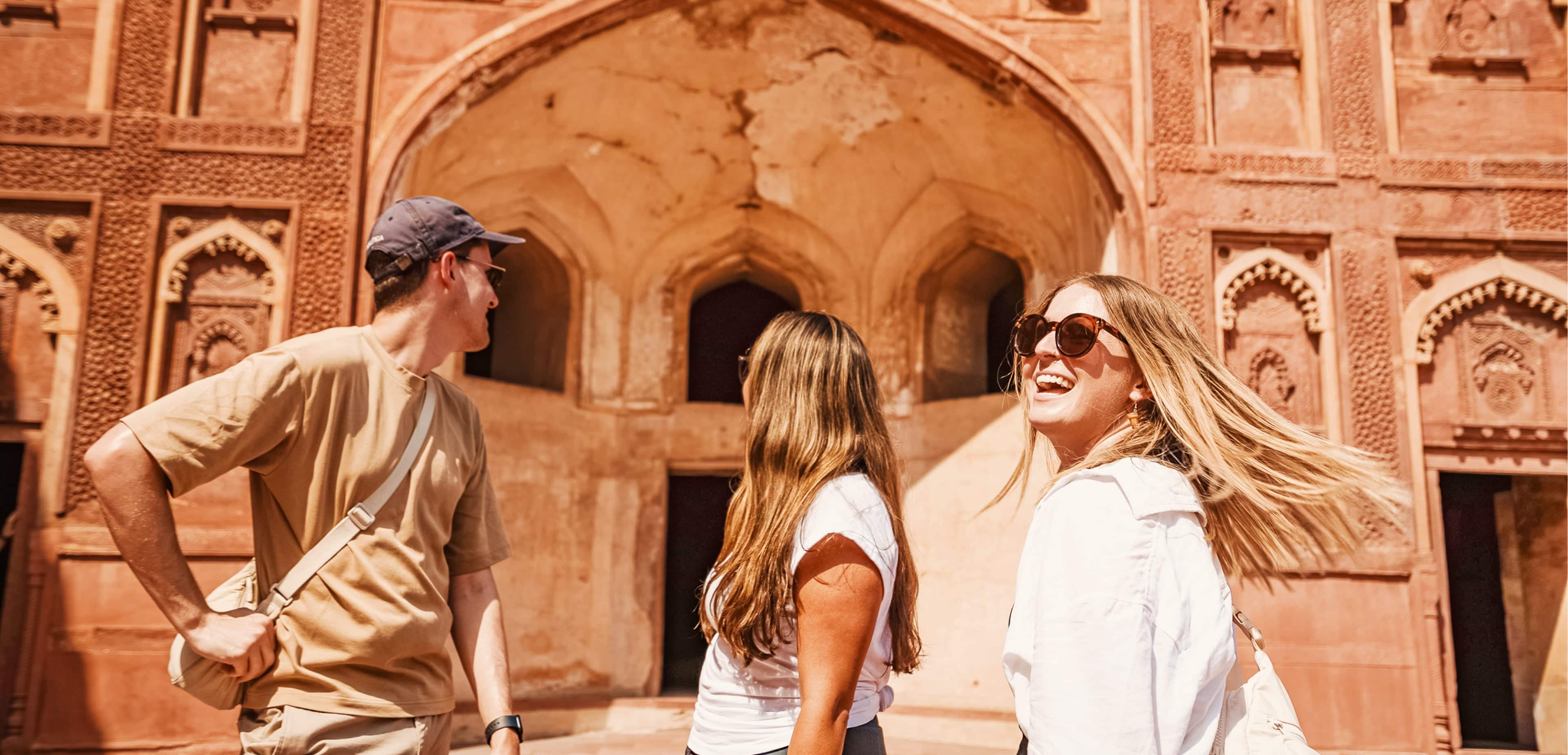 Travellers Entering Ornate Temple India