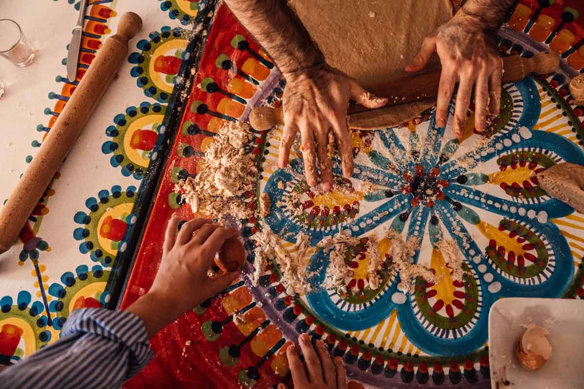 Travellers Making Pasta In Italy