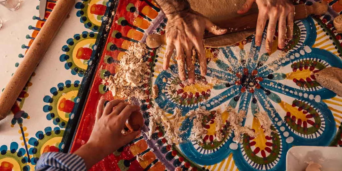 Travellers Making Pasta In Italy