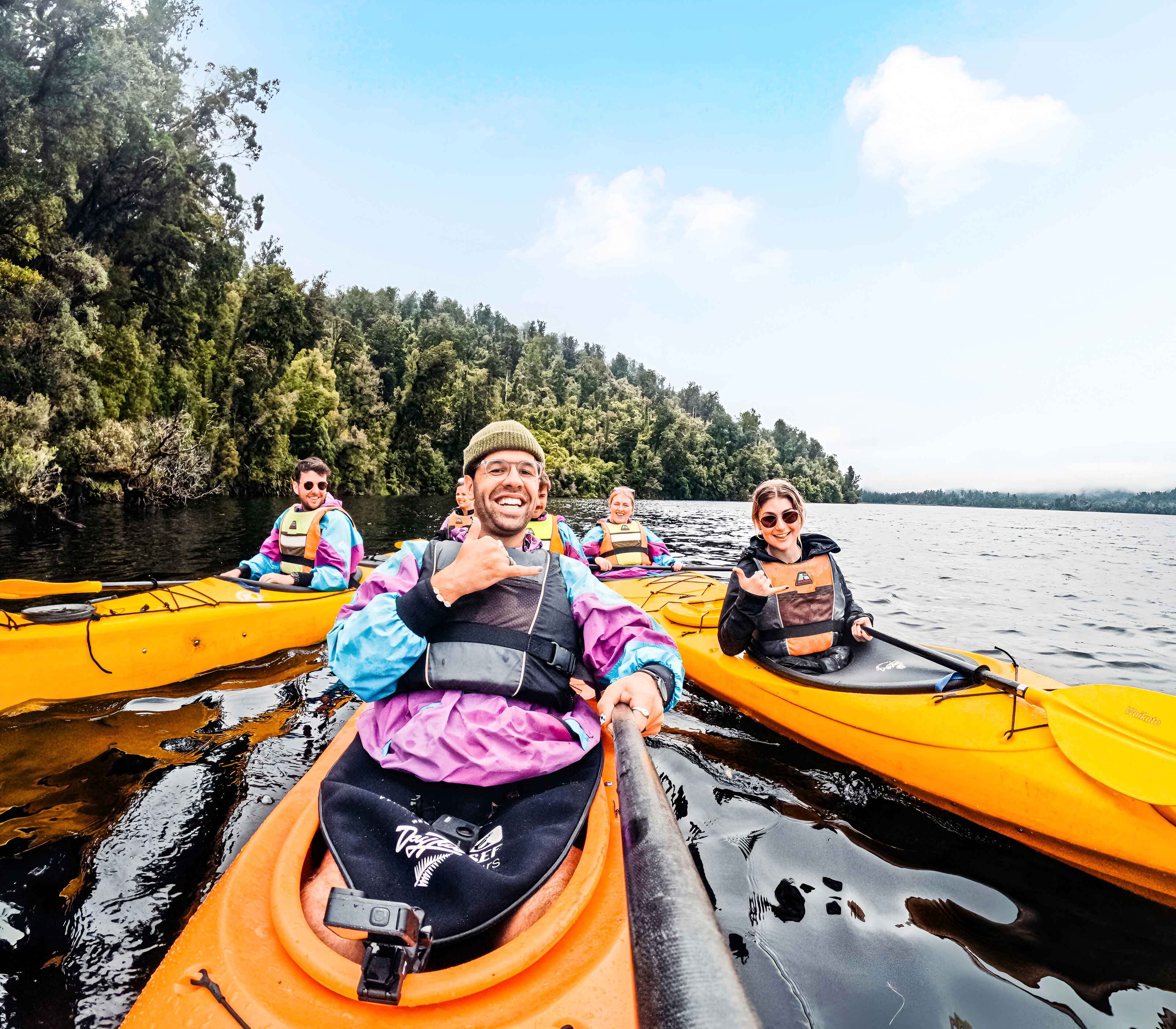 three-happy-people-single-bladed-paddle.jpg
