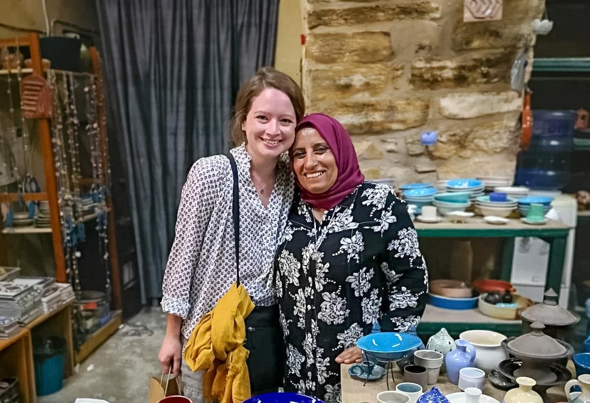 A couple of women standing next to each other