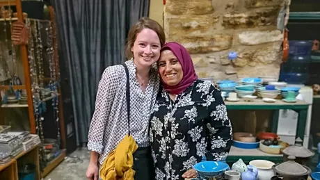 A couple of women standing next to each other