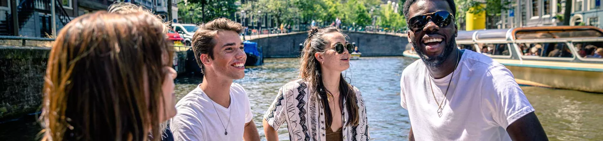 Group Taking A Cruise Down The Canal In Amsterdam 0696EURS2020