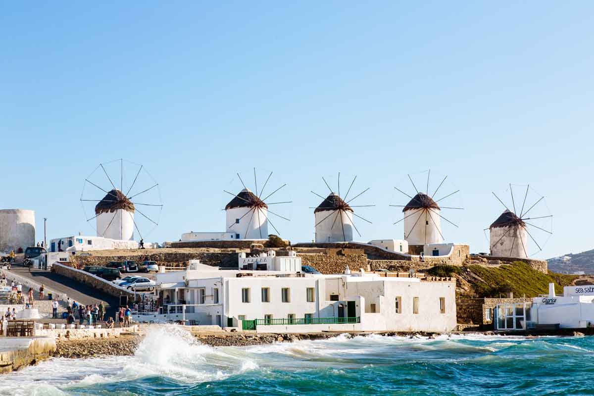 Distant View Of Traditional Windmills On Mykonos Island, Cyclades, Greece