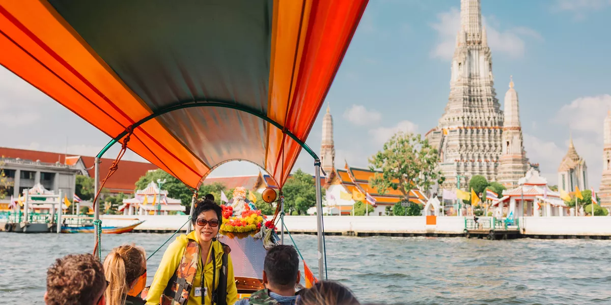 Group Sat On Boat In Thailand