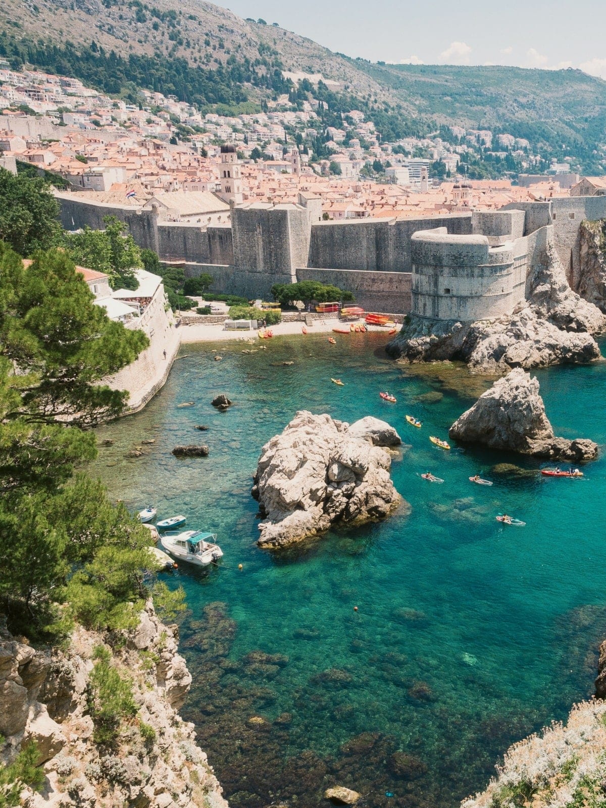 Panoramic view of Dubrovnik Old Town, medieval city walls and the Adriatic coastline in Croatia.