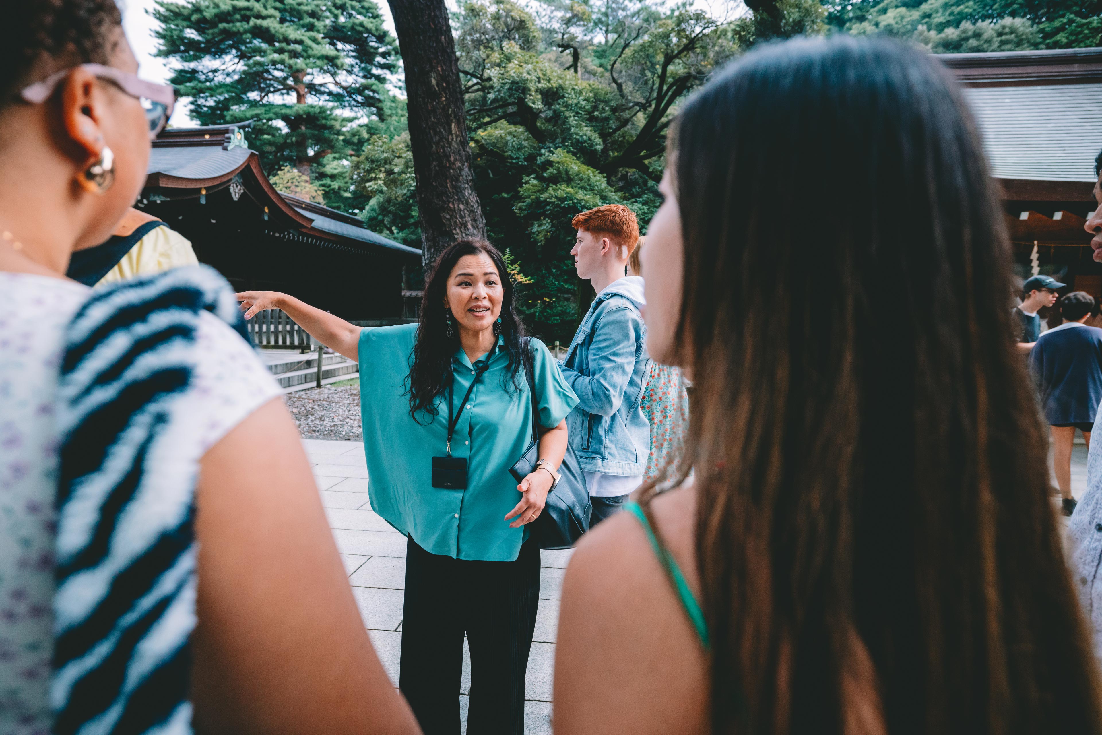 Trip Manager Talking To Group
