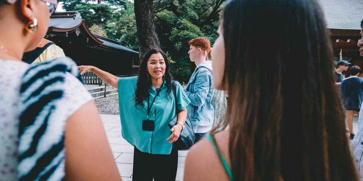 Trip Manager Talking To Group