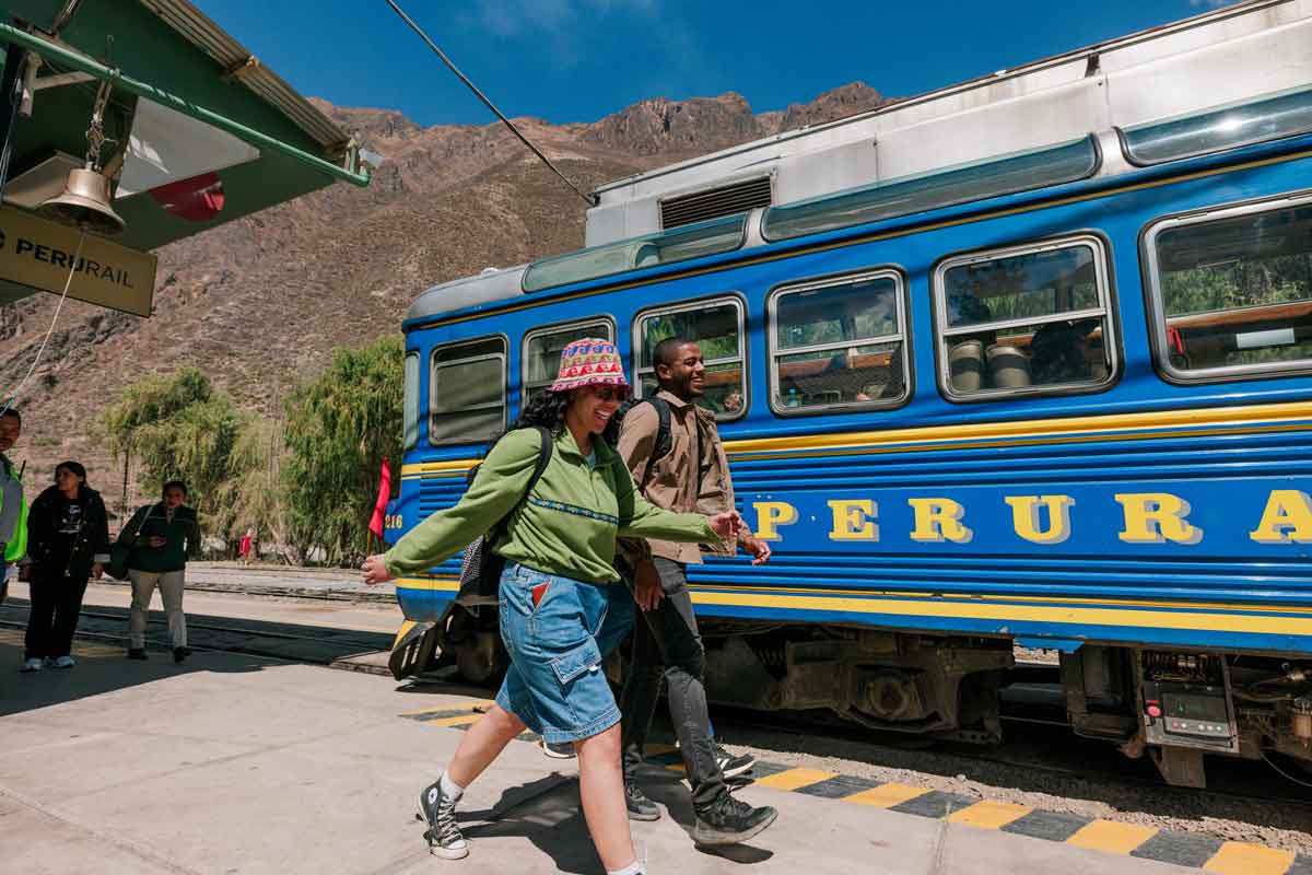 Travelers At A Train Platform In Peru