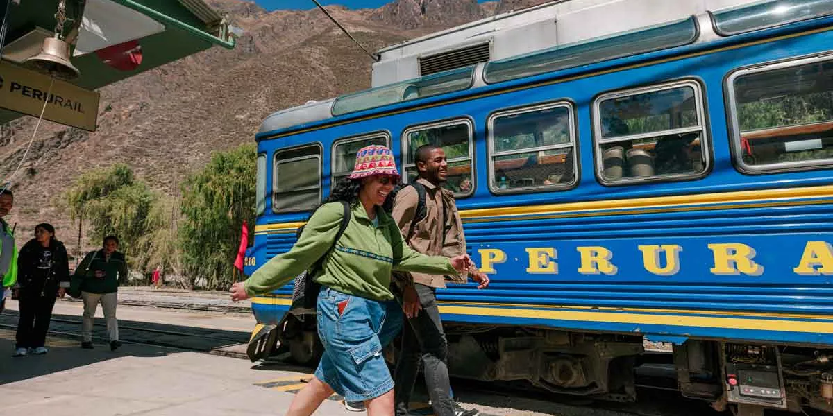 Travelers At A Train Platform In Peru
