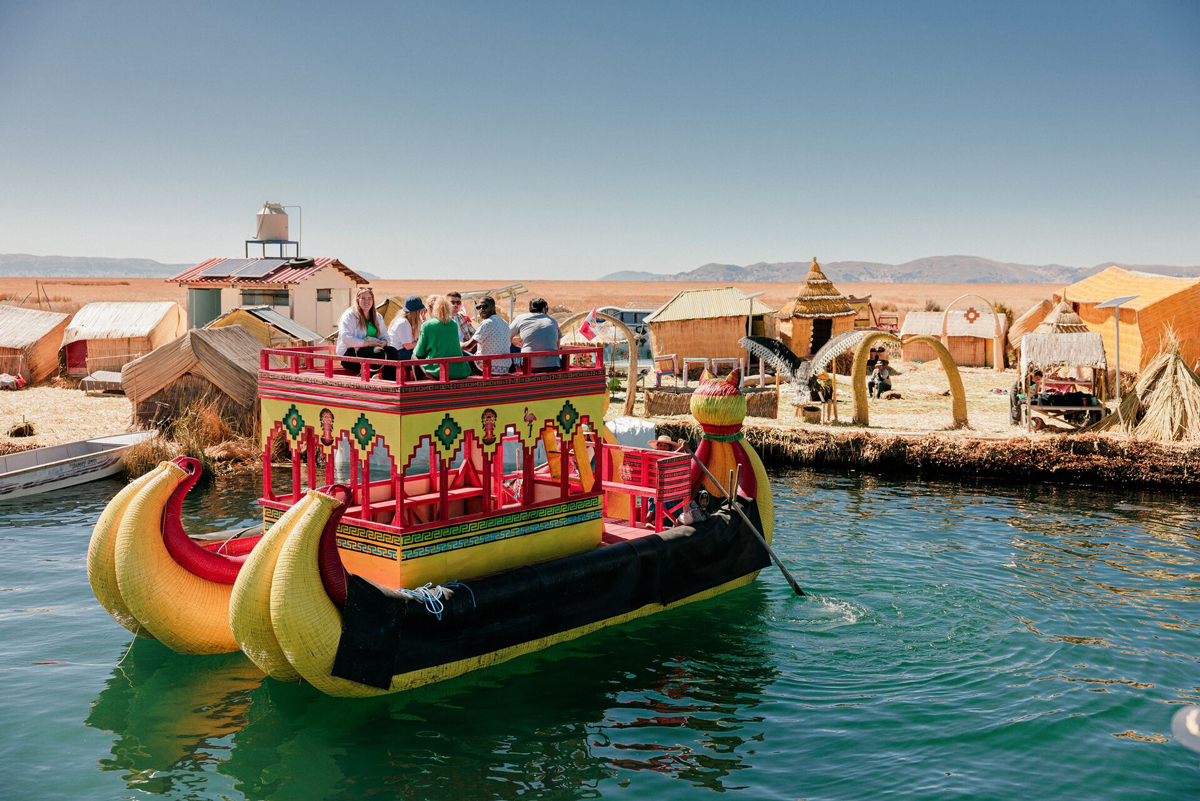 Group Sat In Boat In Peru