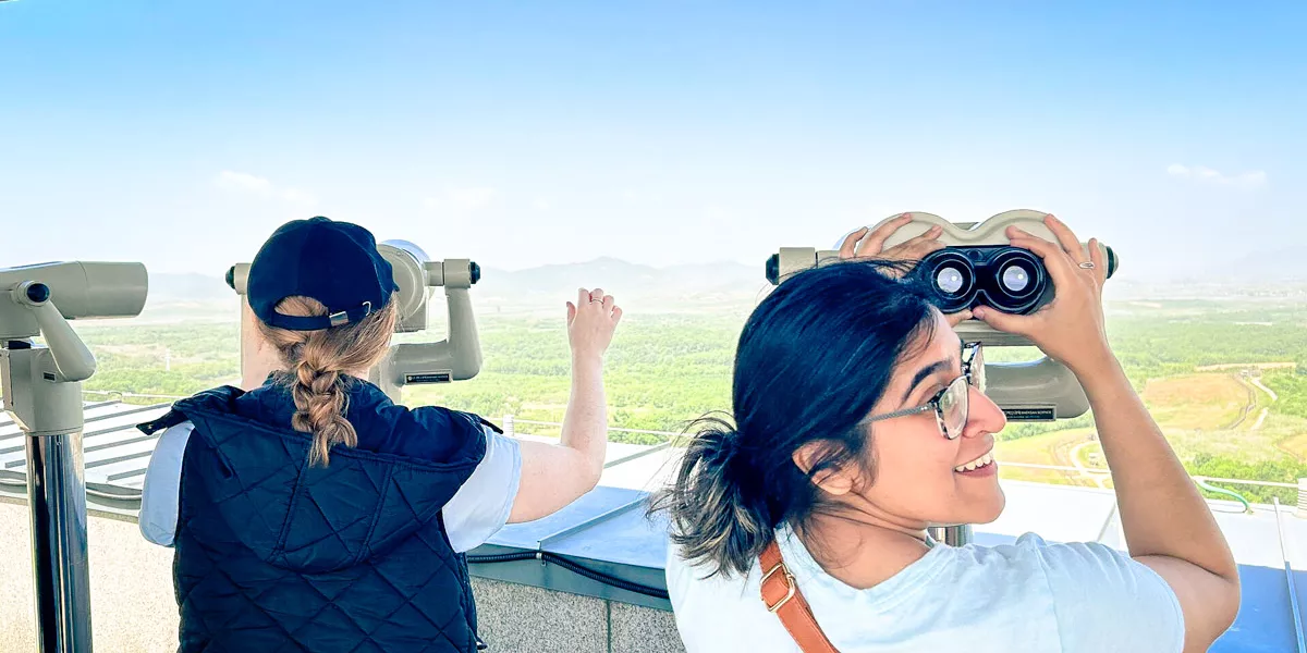 Smiling Woman Observing Landscape