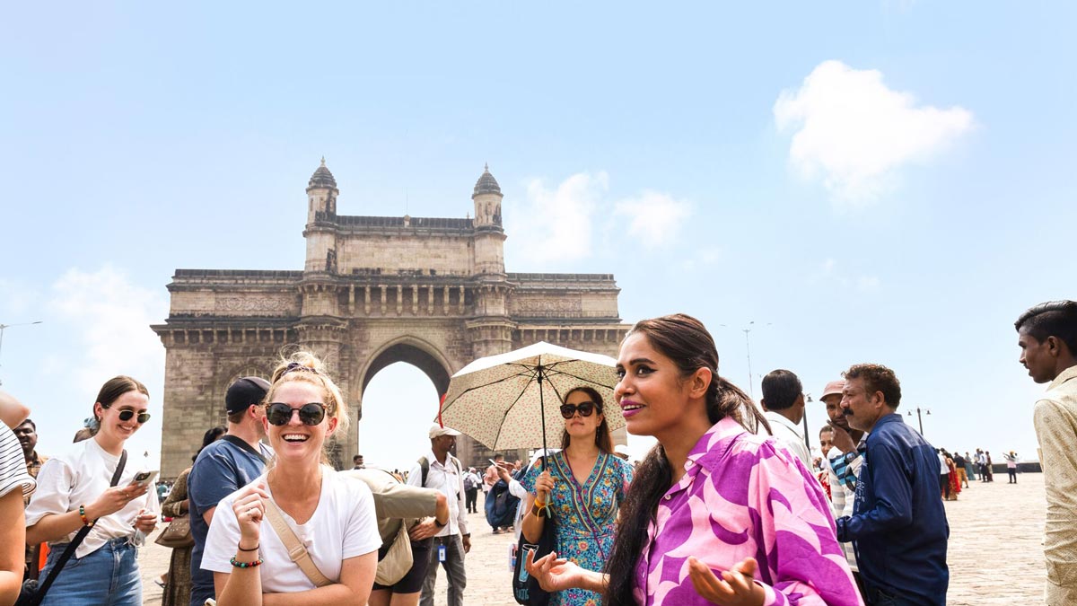 Group Of People Enjoying A Tour Around A City