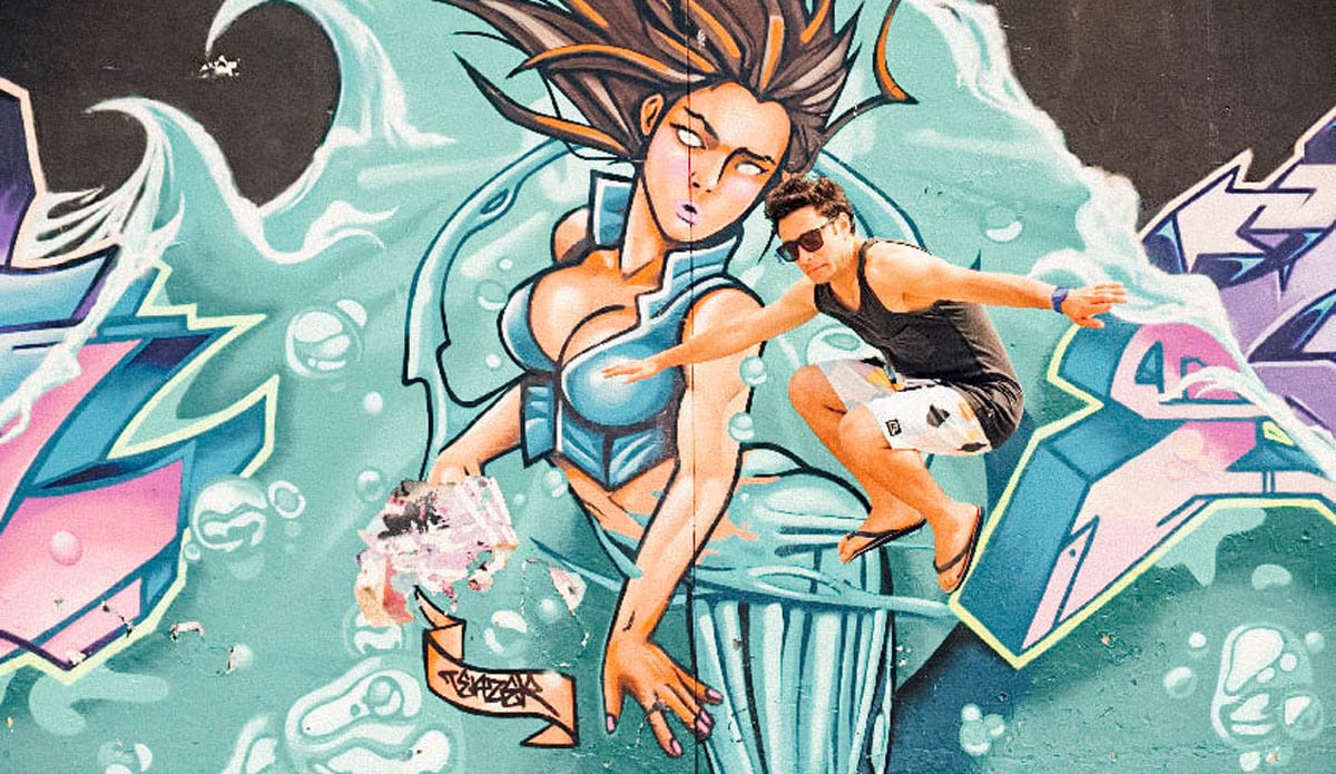 Man in shorts jumping high up