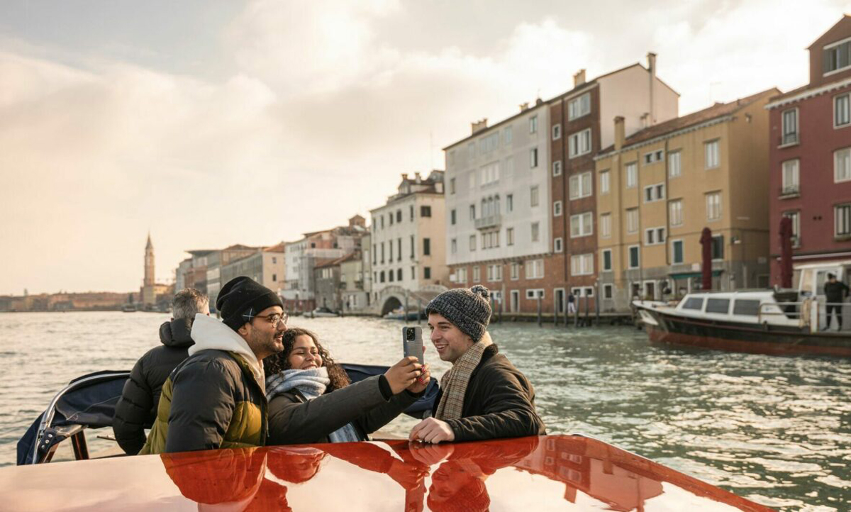 Group Of Friends Taking Photo In Boat