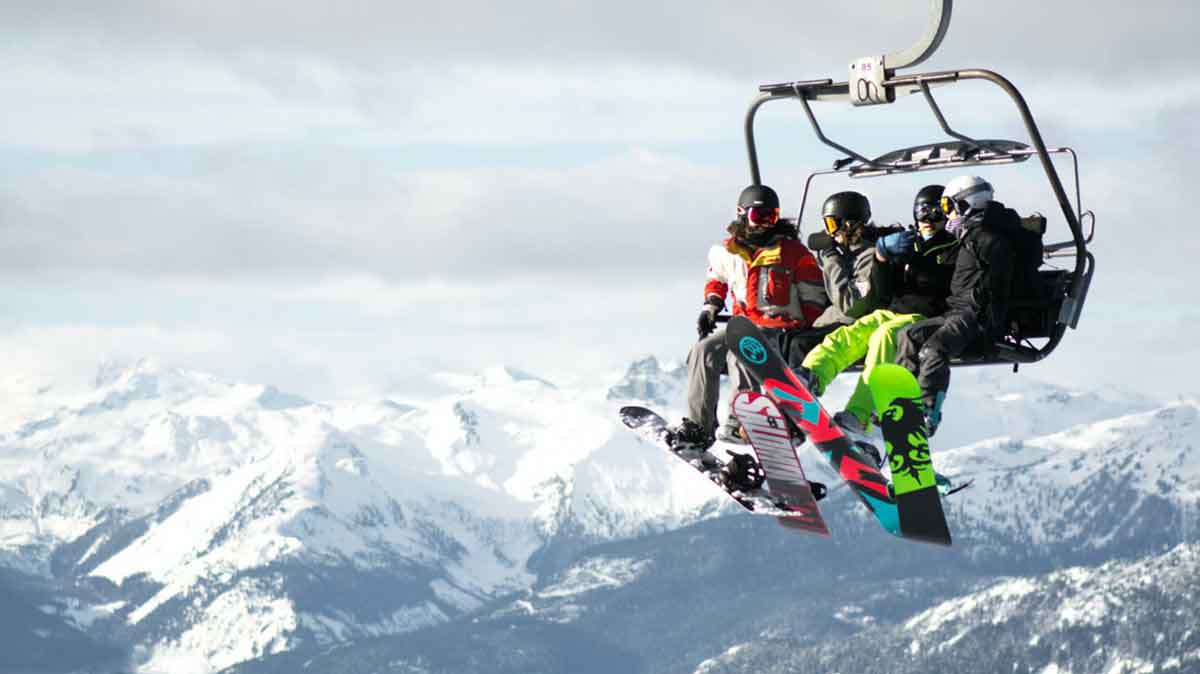 Group Of Snowboarders On Lift