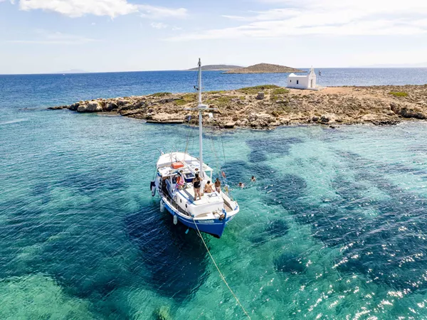 Boat In Crystal Waters Greece