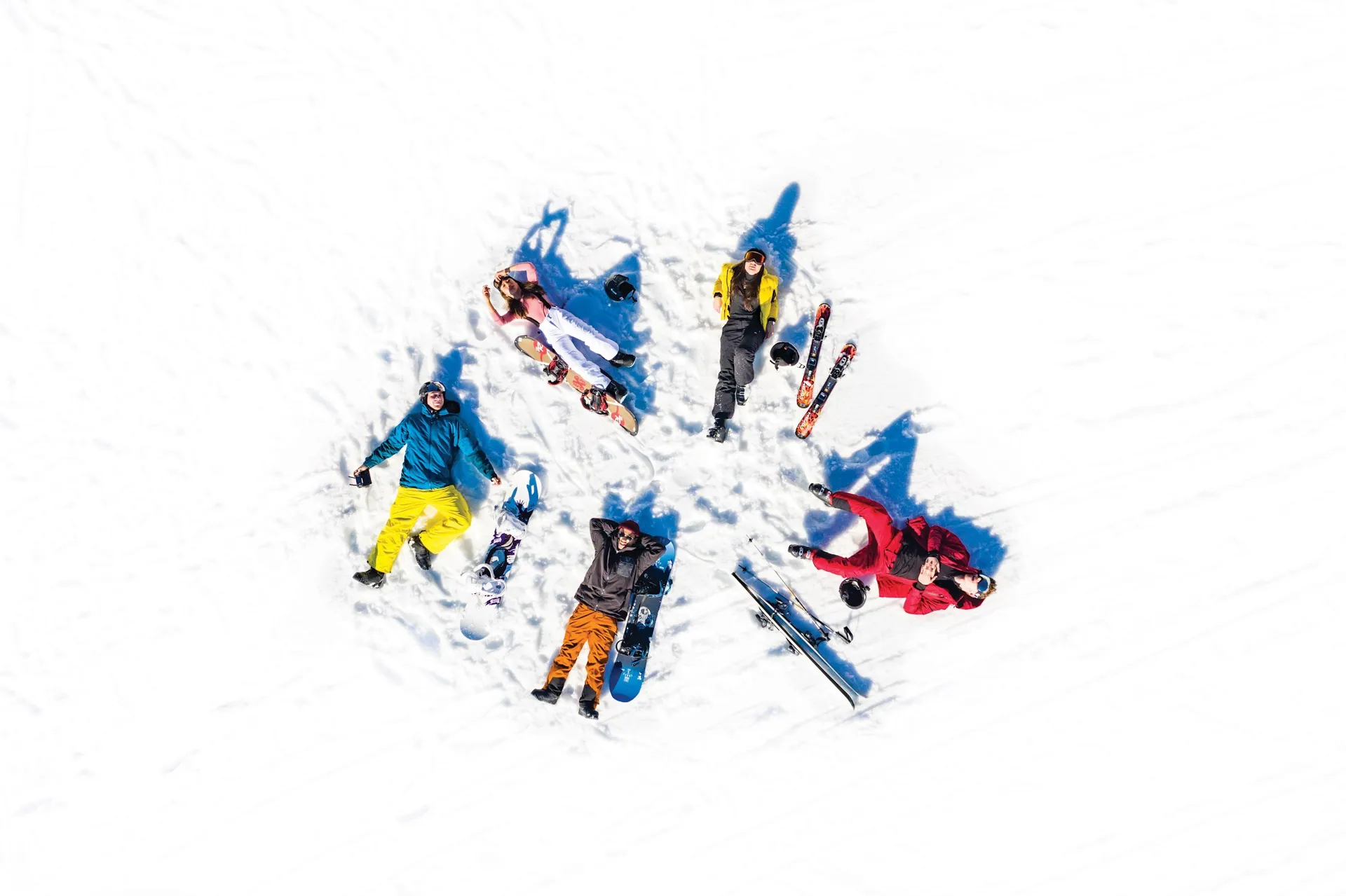 Aerial shot of Travellers making Snow Angels in Hopfgarten, Austria