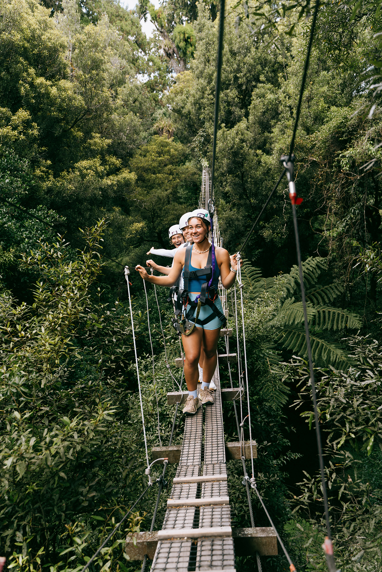 A Traveller ziplining in Rotorua, New Zealand