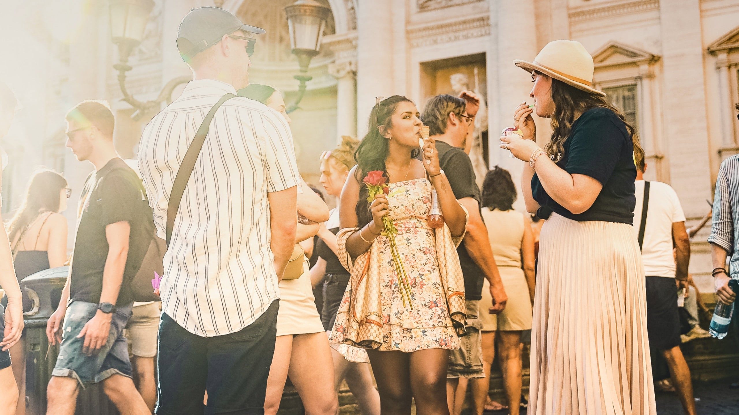 Contiki travellers enjoying gelato together in Piazza Navona, Rome, on the Rome to London Trail Tour