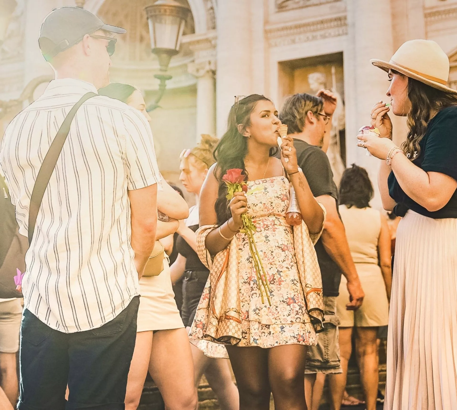 Contiki travellers enjoying gelato together in Piazza Navona, Rome, on the Rome to London Trail Tour