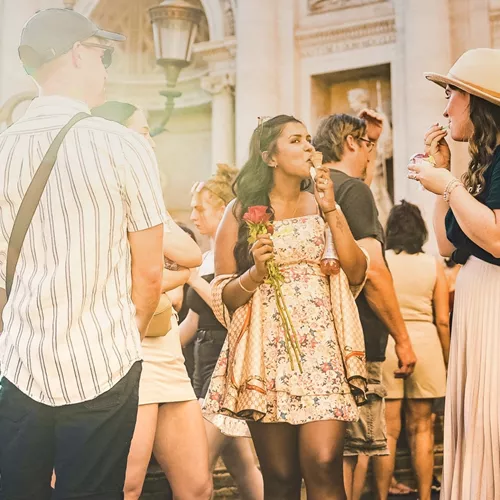 Contiki travellers enjoying gelato together in Piazza Navona, Rome, on the Rome to London Trail Tour