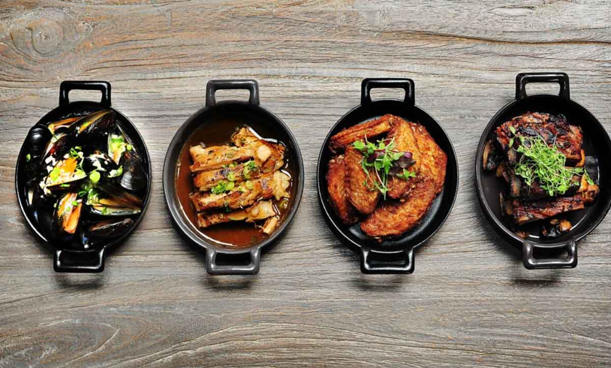 Different Dishes On Wood Table