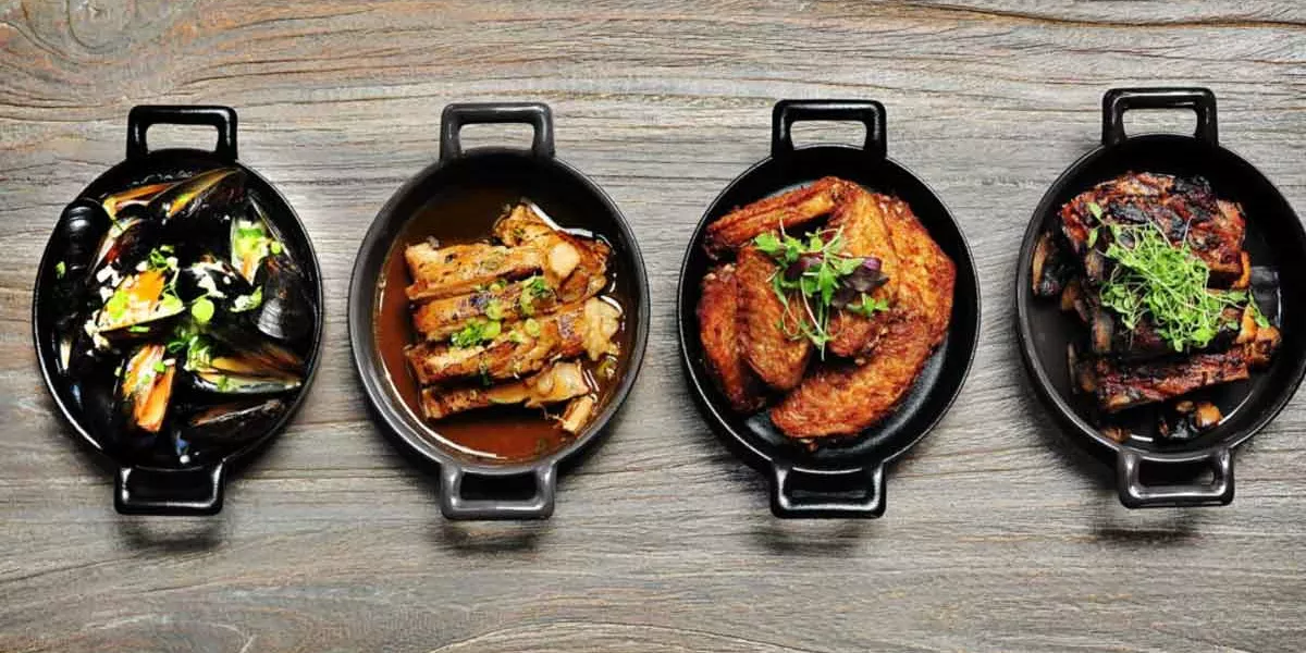 Different Dishes On Wood Table