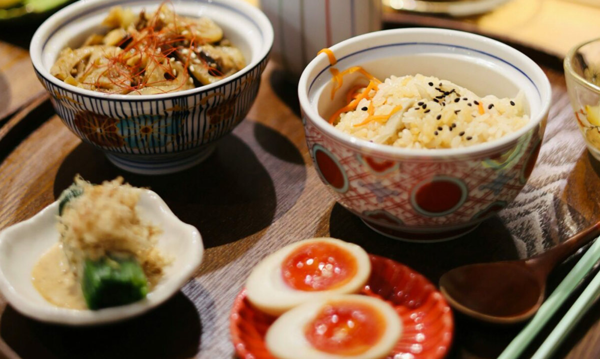 Traditional Japanese Food Served On Wood Table