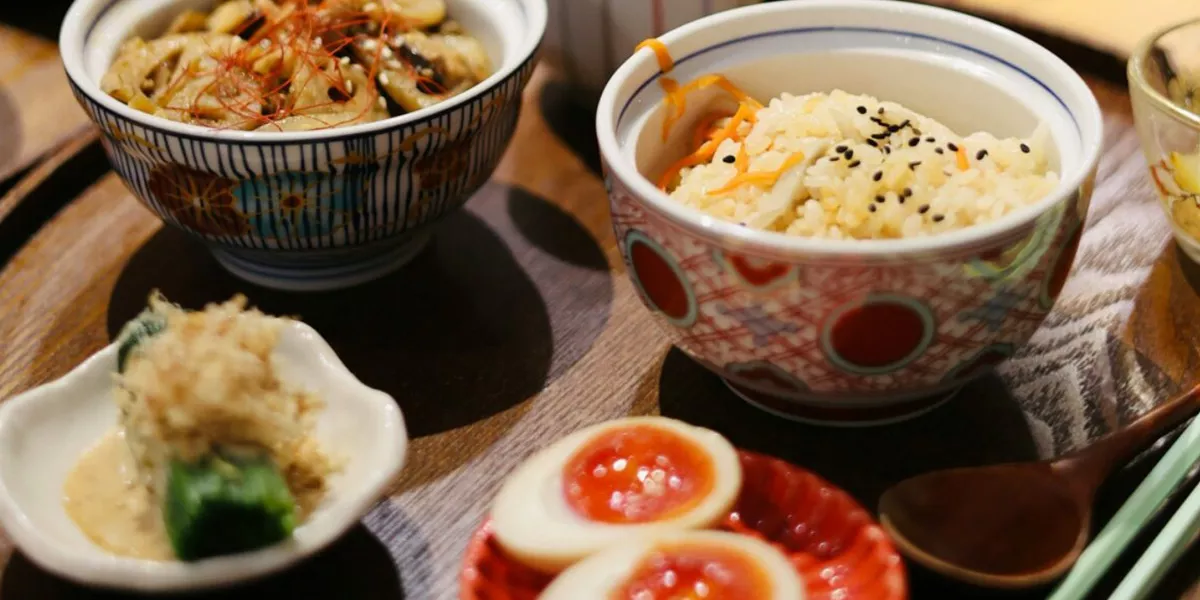 Traditional Japanese Food Served On Wood Table